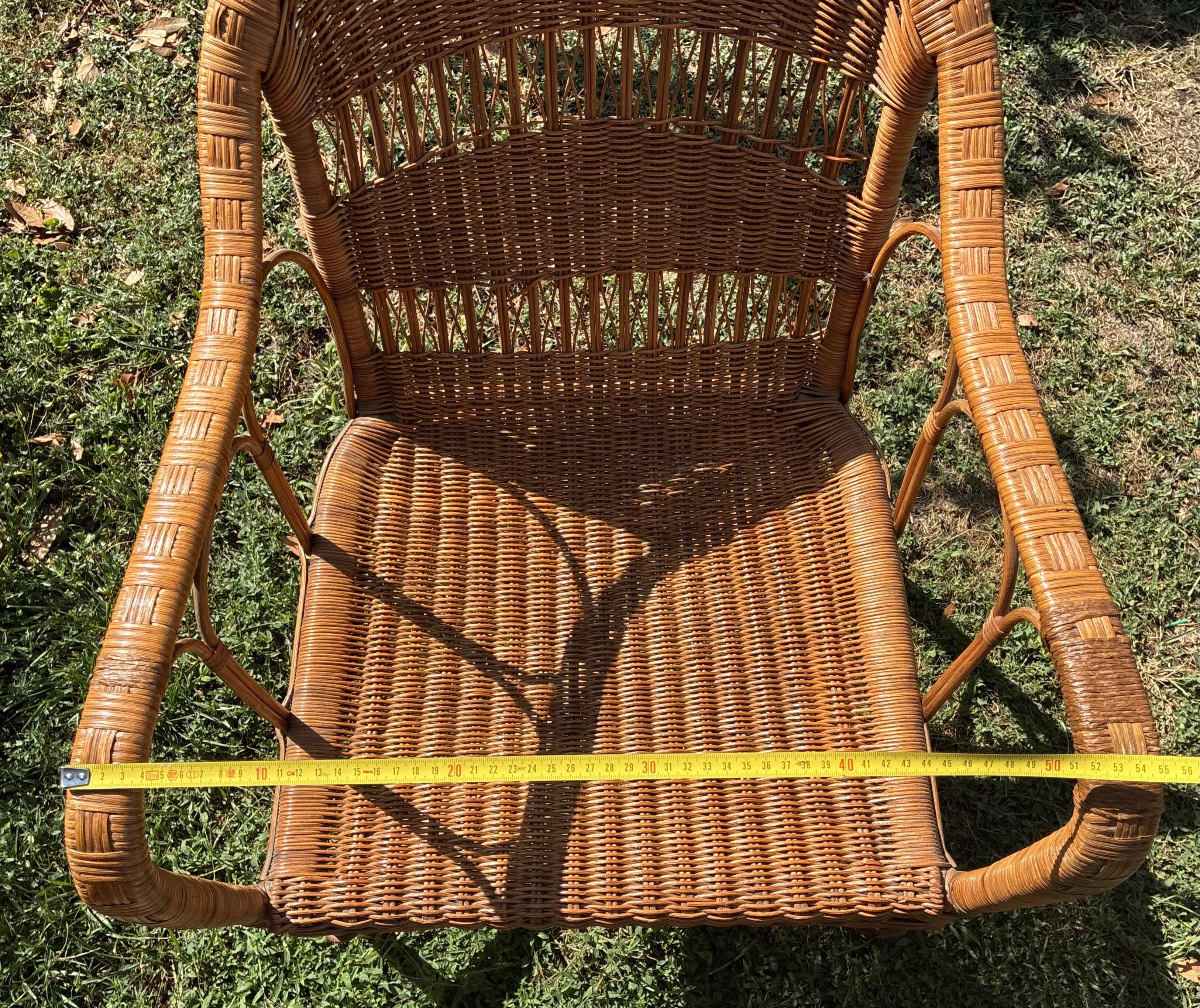 Vintage colonial lounge chair in rattan, pre-1950s.