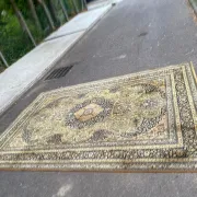 Large Persian wool rug 250x350 cm in gold and navy blue.