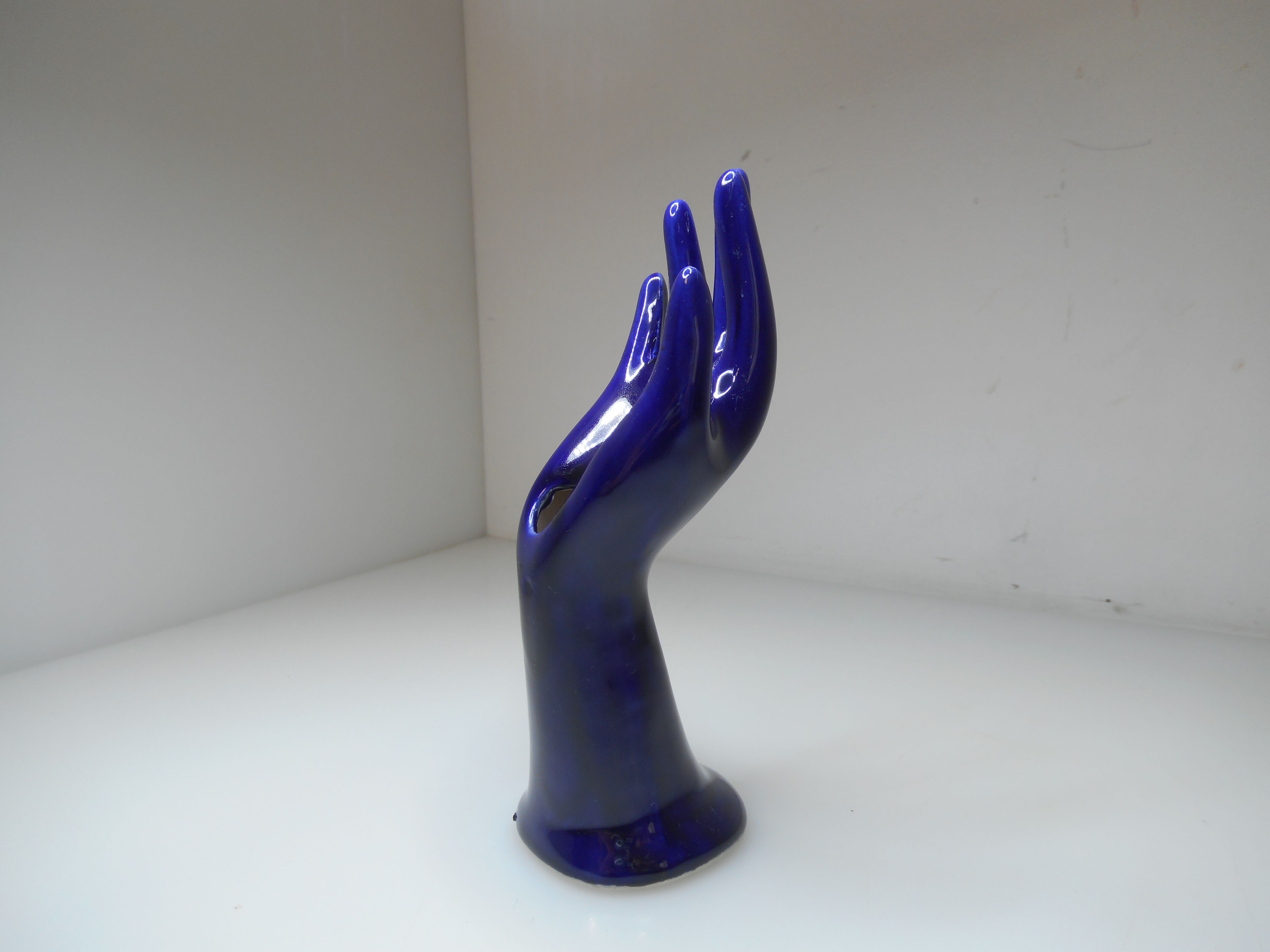 Vintage blue ceramic hand