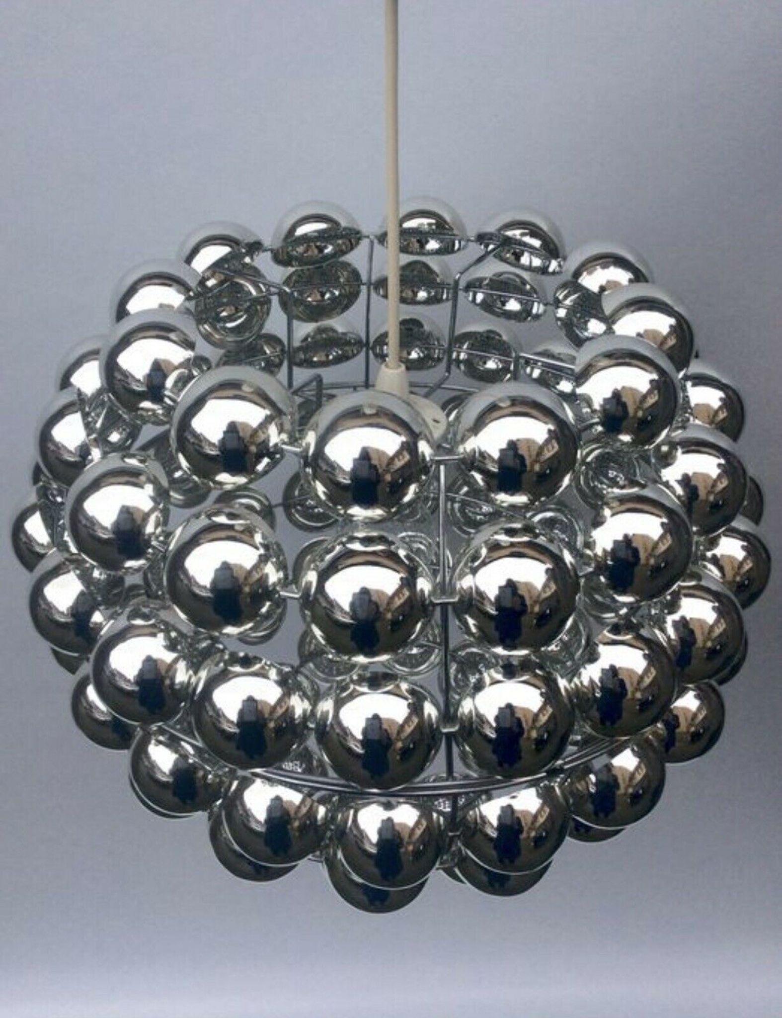 Kinetic suspension lamp with half swivel spheres from the 70s