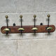 Wood and brass coat rack