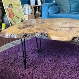 Tripod coffee table in natural solid elm magnifying glass