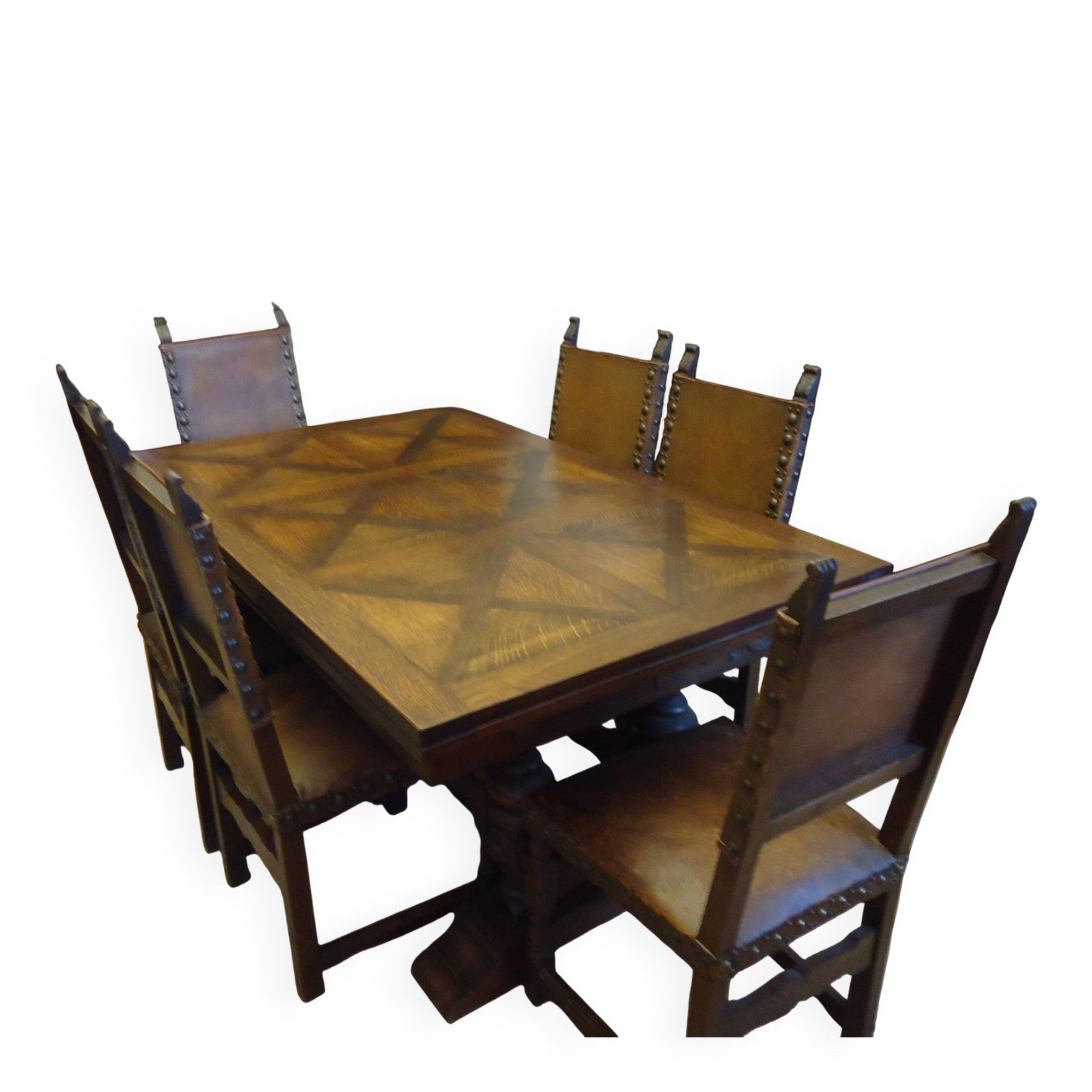 Dining table and 6 solid wood chairs from the 1950s.