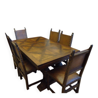 Dining table and 6 solid wood chairs from the 1950s.