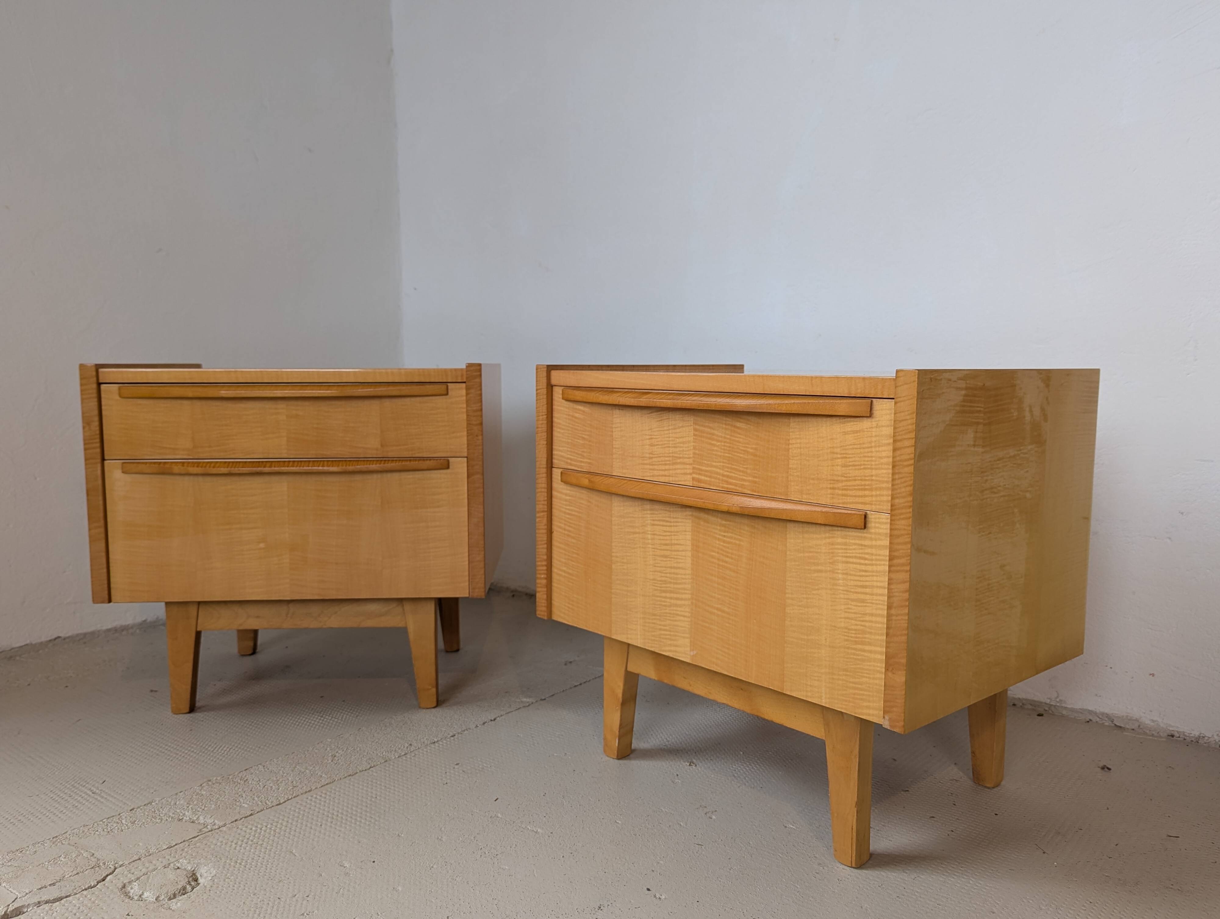 Pair of bedside tables in light wood