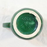 Pichet vert vintage en faience de St clement decor de panier fleuri