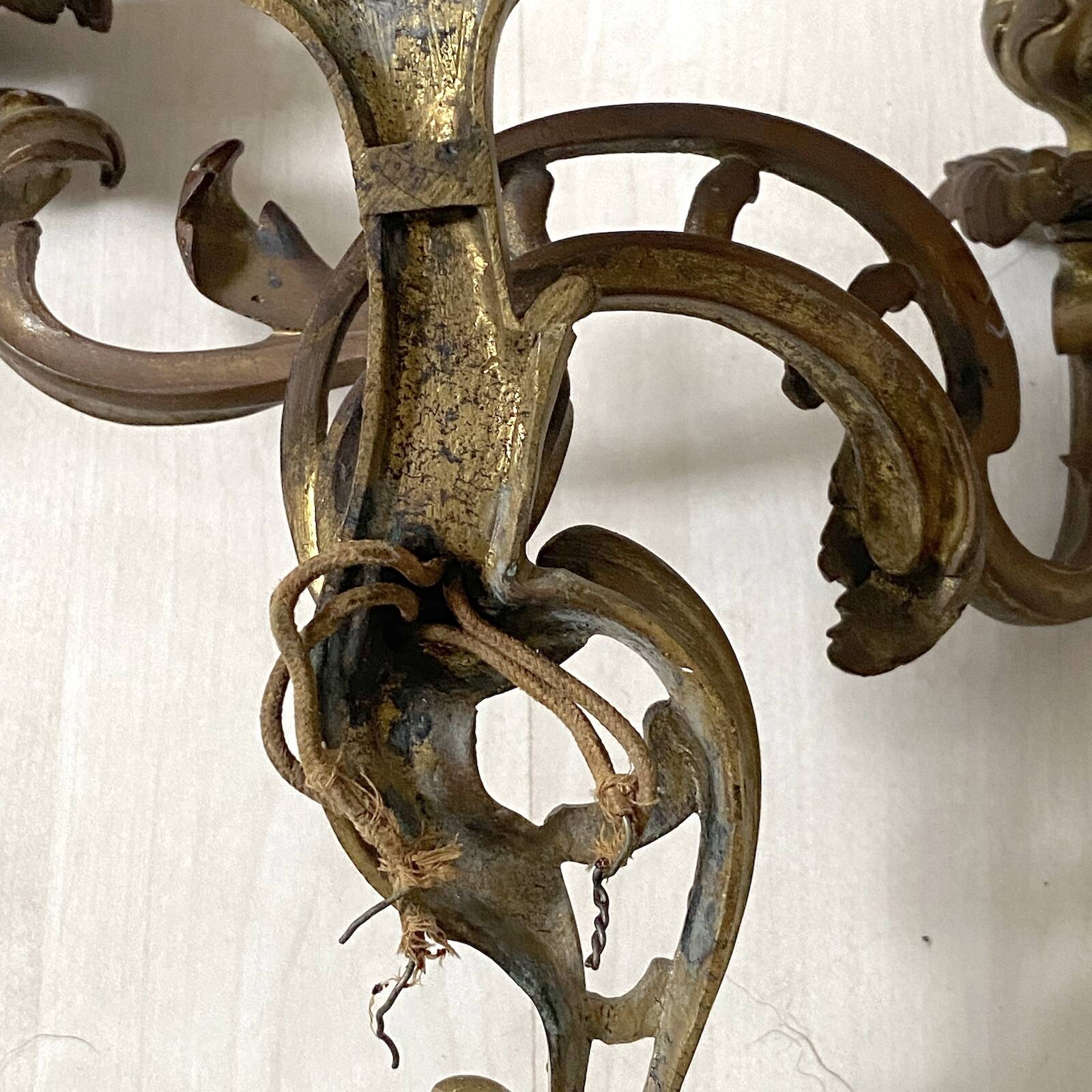 Pair of bronze wall sconces in Louis XV style