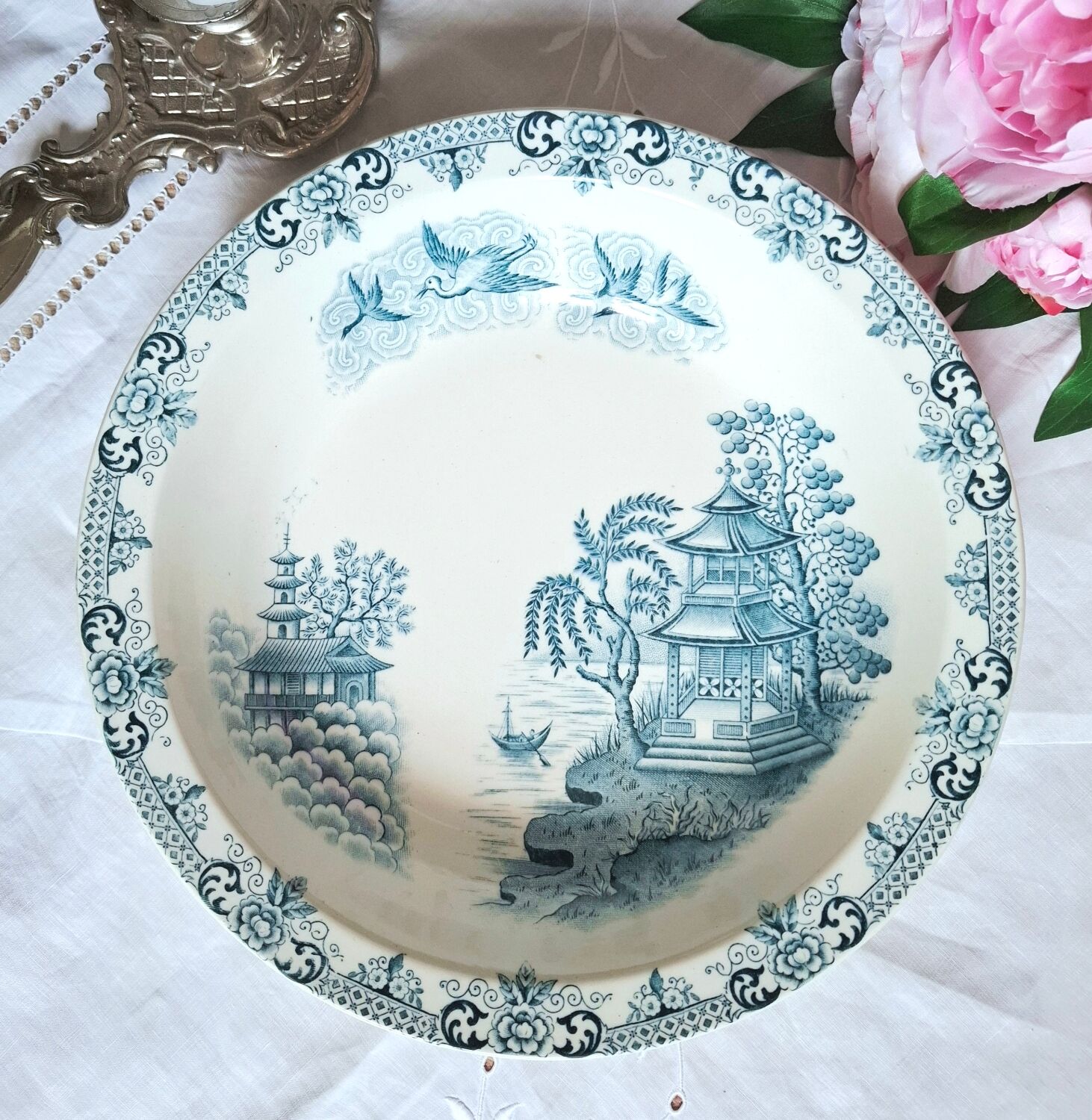 Mismatched antique flat plates made of ironstone accompanied by