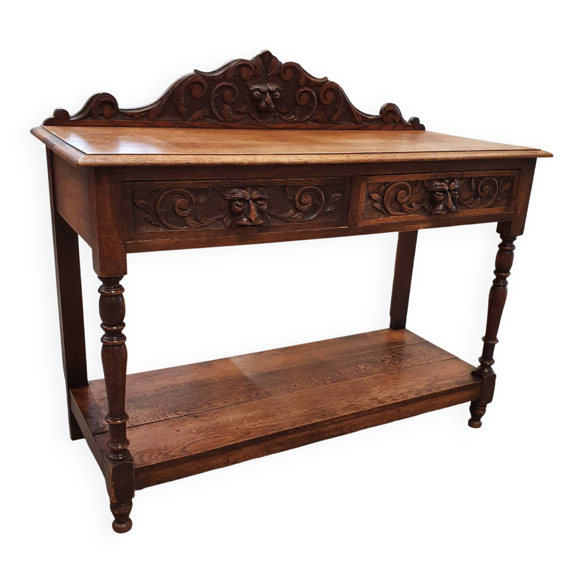 Victorian Gothic Oak side table, decorative carved round 1920. Green Mask decoration