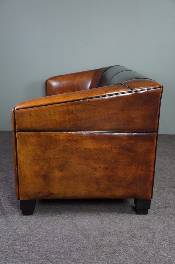 2.5-seater art deco style sofa in sheepskin