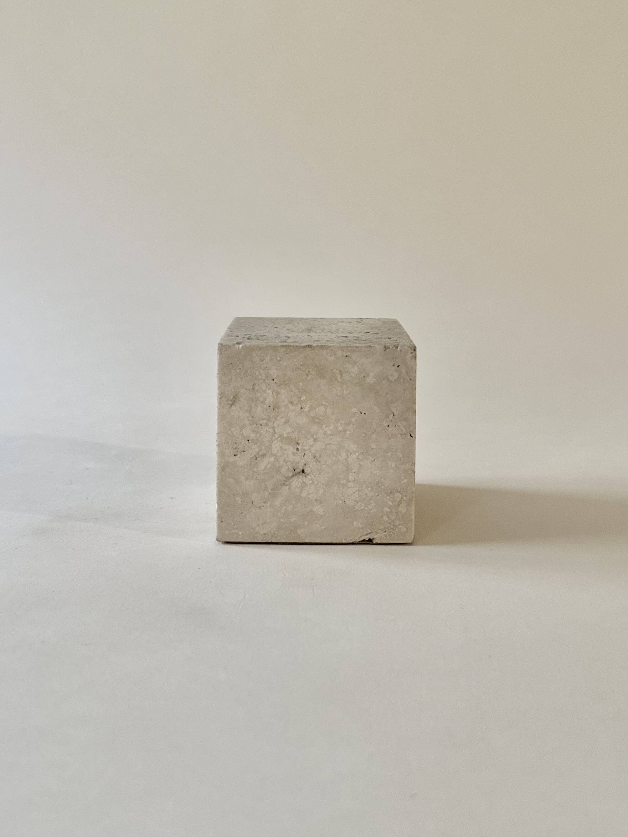 Travertine open-air cube