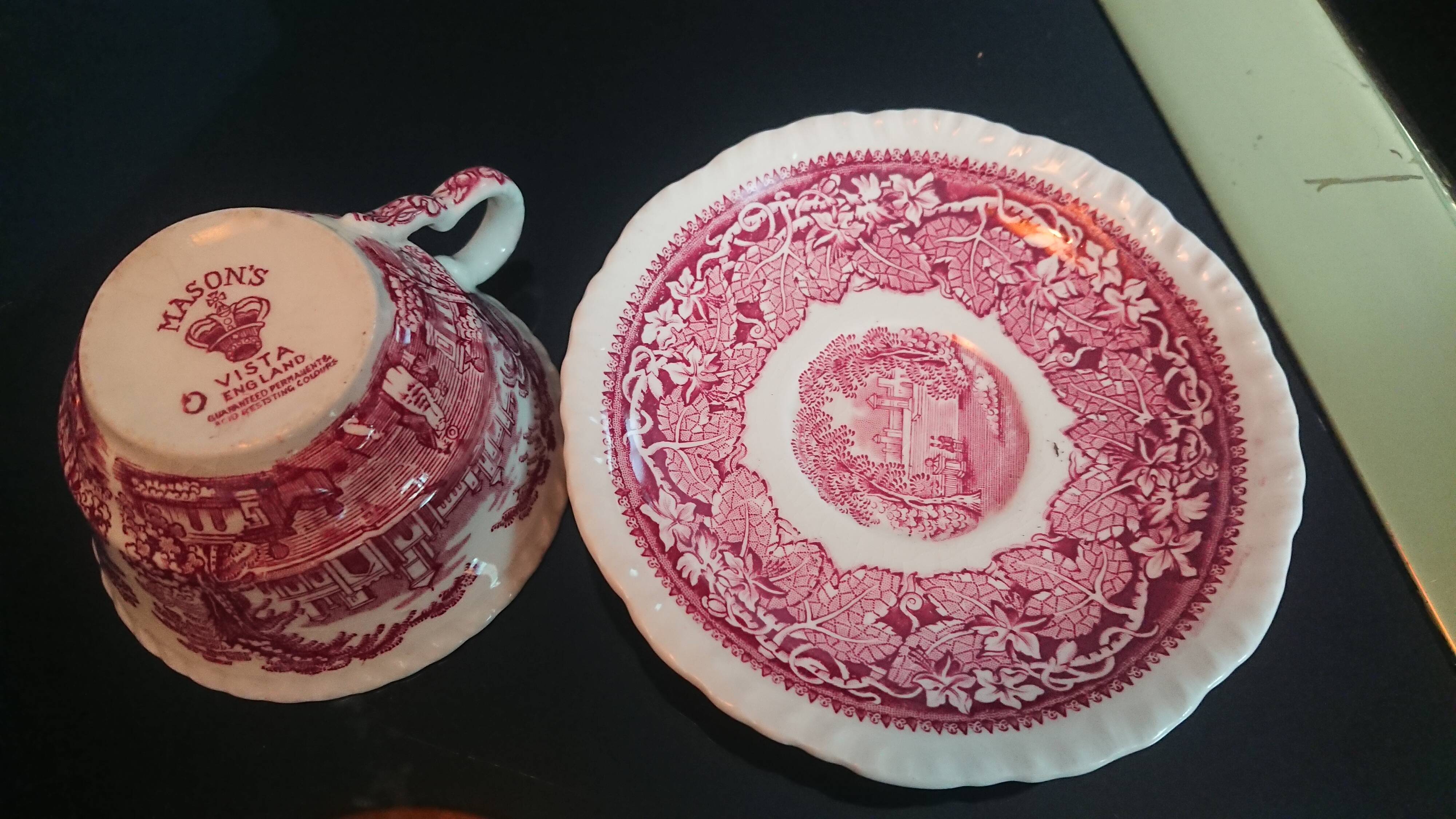 Tea cup and English earthenware saucer