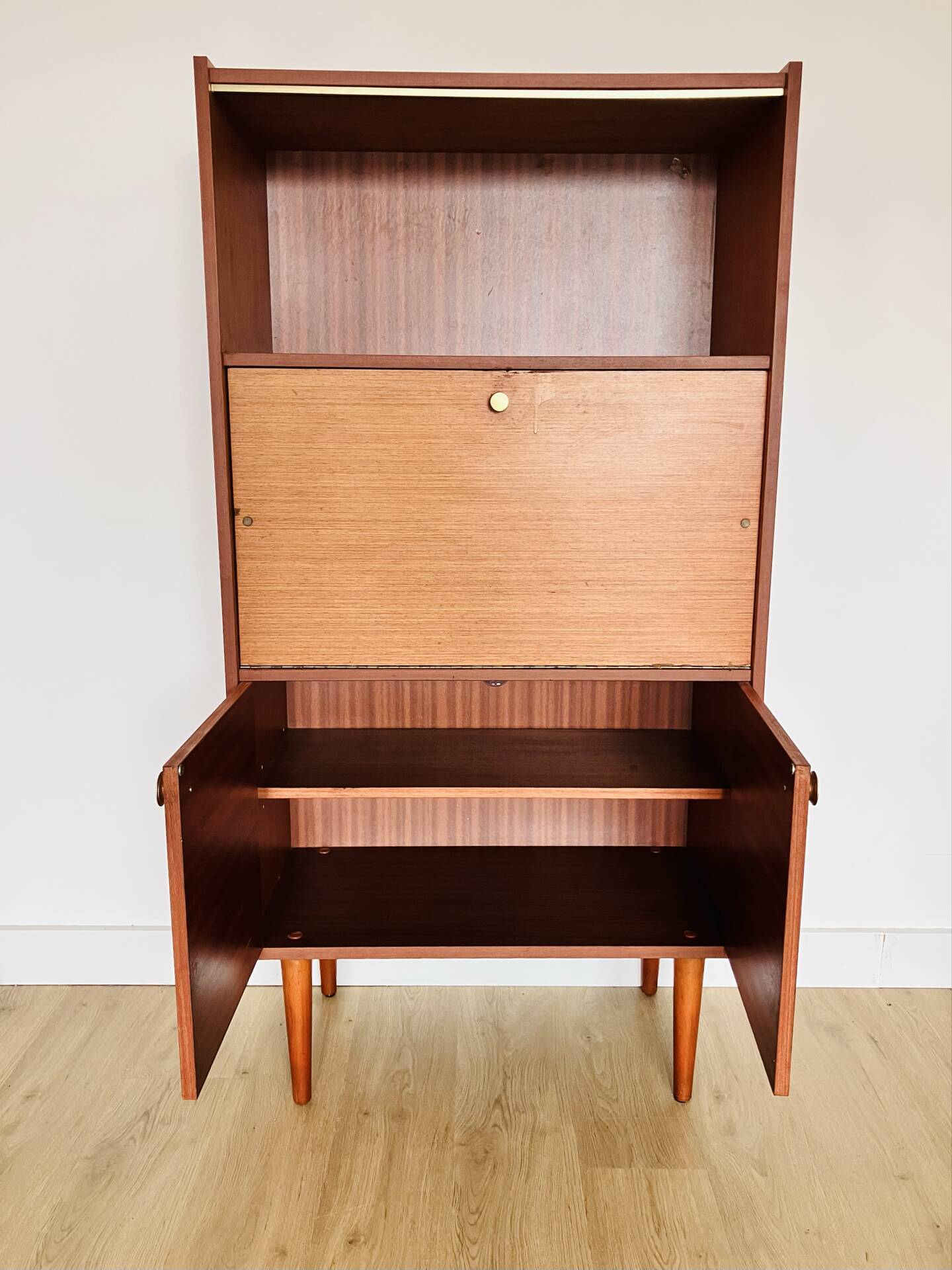 Wood veneer secretary from the 1970s.