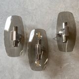 Trio of vintage chrome and smoked glass wall sconces