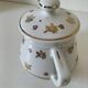 Porcelain teapot Louis Lourioux, decorated with roses and pyroluxe gilding.