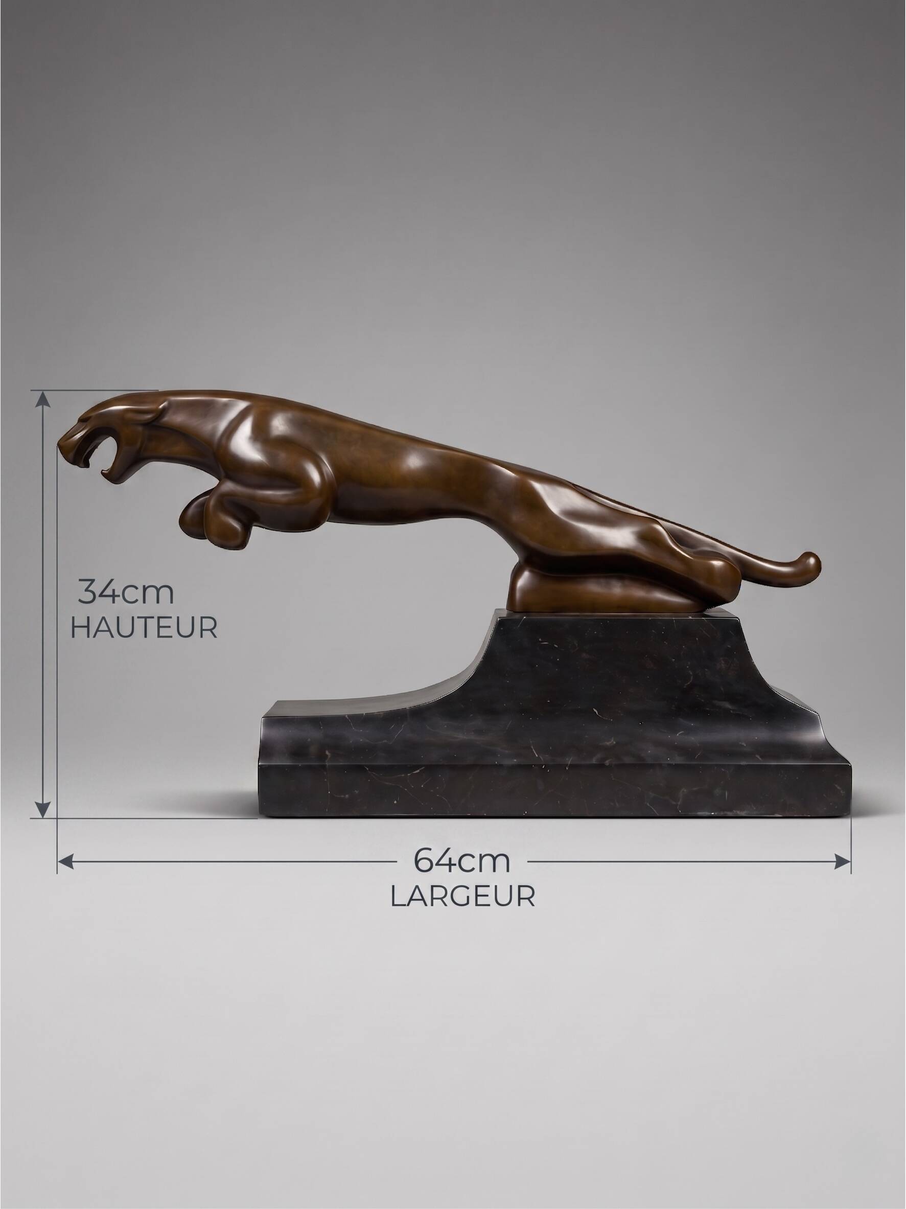 Large Art Deco bronze patinated Jaguar sculpture on an architectural base.