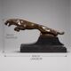 Large Art Deco bronze patinated Jaguar sculpture on an architectural base.
