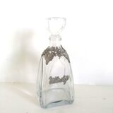 Whisky decanter decorated in tin