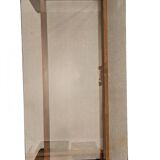 Glass coffee table with a wooden frame.