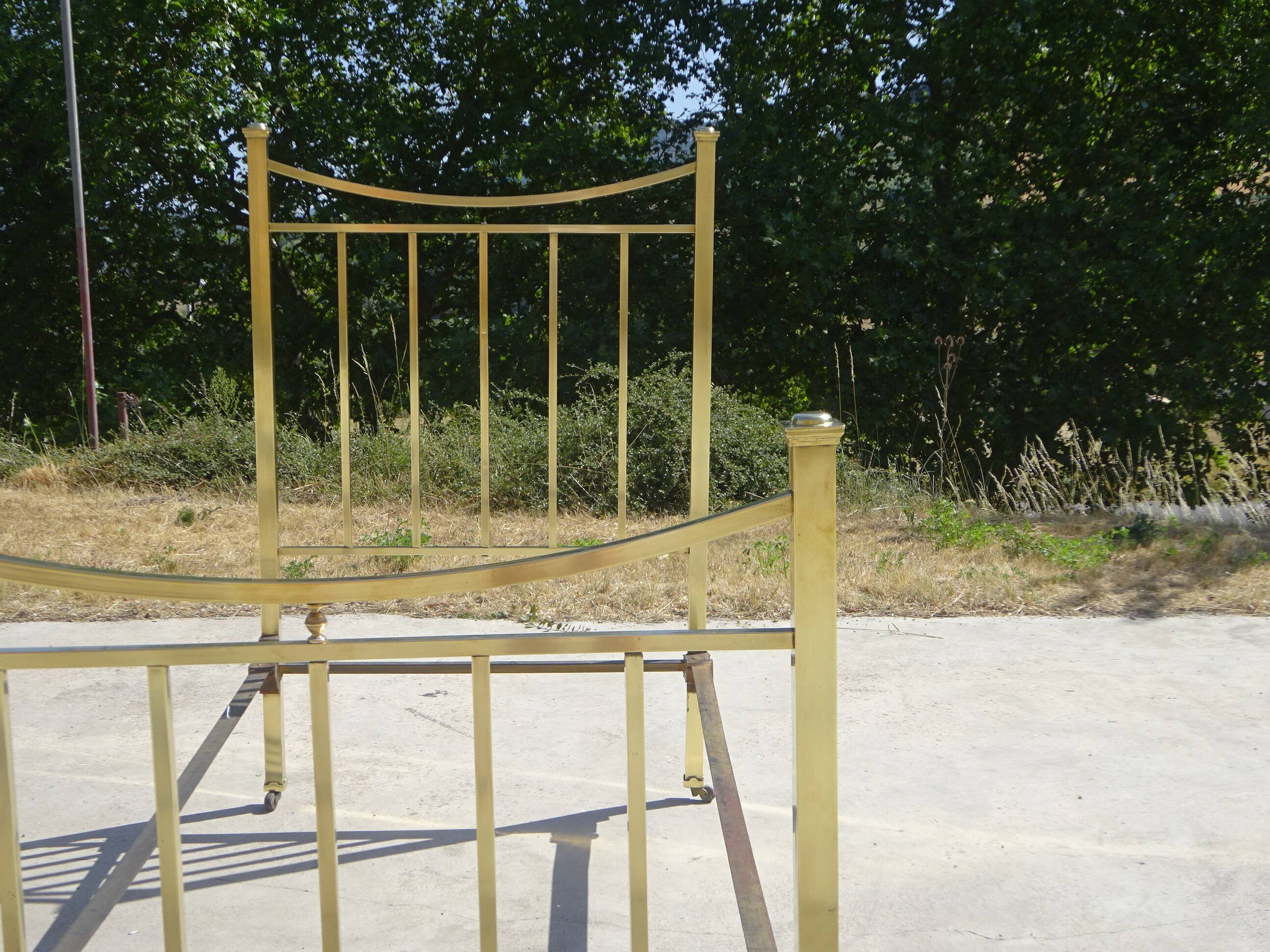Antique gold-plated brass bed for one person.