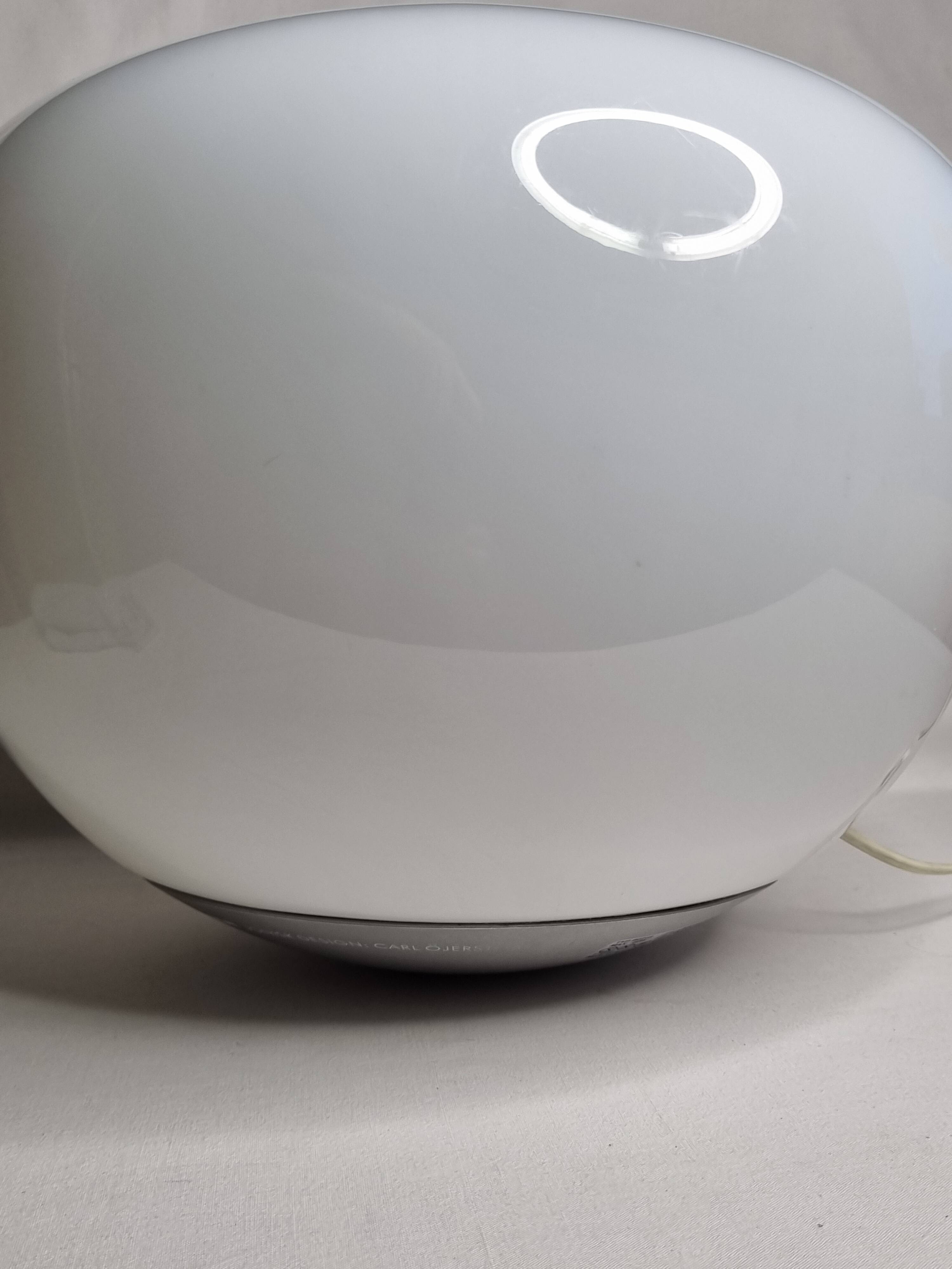 Jonisk floor lamp, designed by carl öjerstam, pebble shape in polycarbonate 38 cm