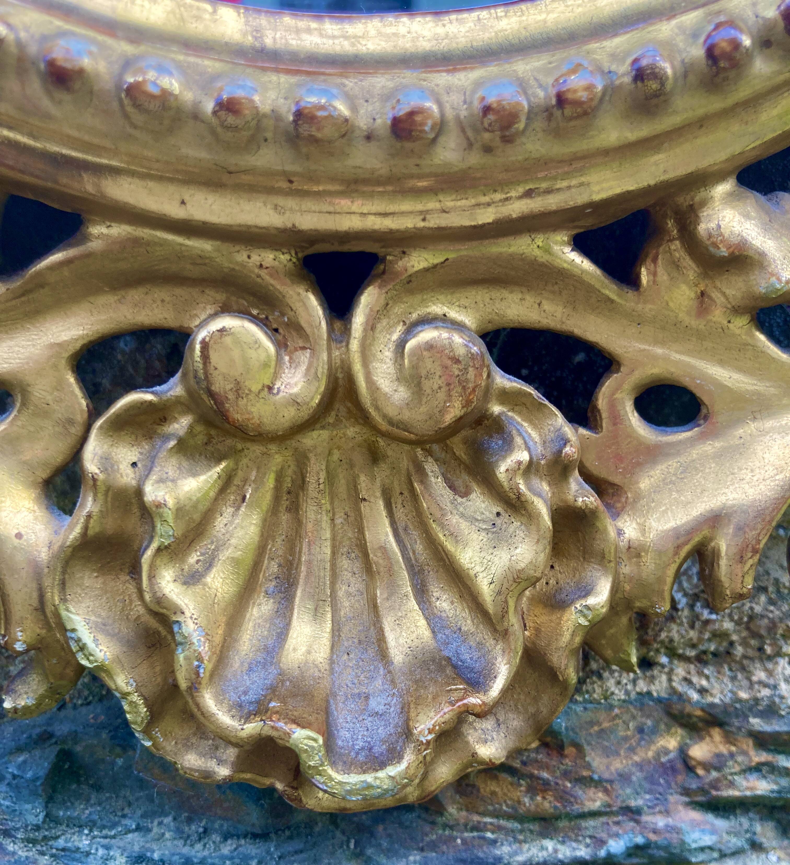 Mirror in carved wood gilded with leaf, Louis XV period, 18th century