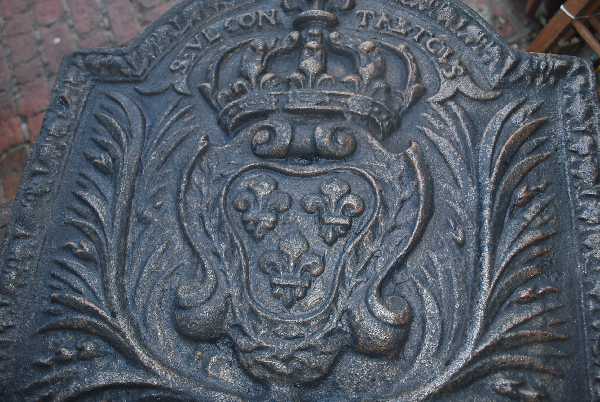 Old cast iron fireplace plate