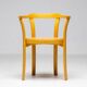 Stackable chairs in curved beech.