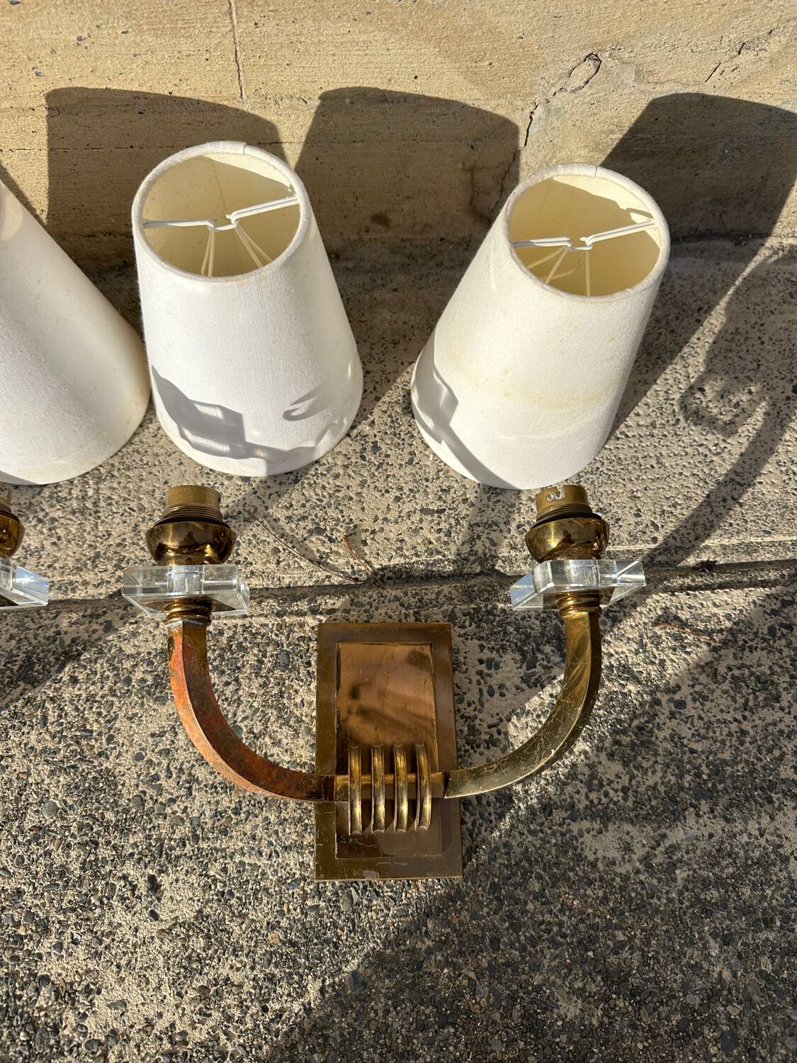 Antique Art Deco wall sconces attributed to Jacques Adnet.