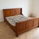 Double bed 160 cm in solid walnut with electric mattress base.