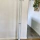 White lacquered metal coat rack published by Seccose in the 1980s.
