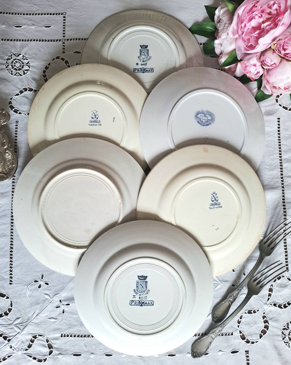 Mismatched antique ironstone dinner plates
