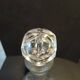 Vintage cut crystal carafe with floral stopper.