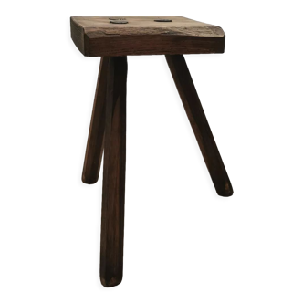 Old wooden stool tripods