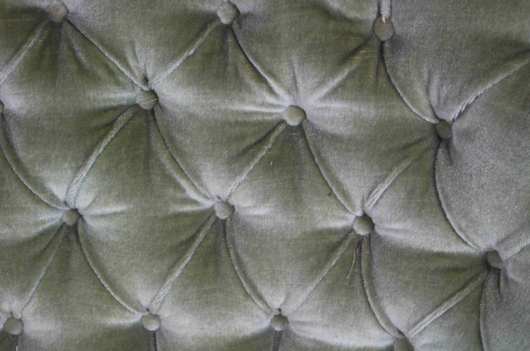 Danish curved green button sofa from the 1940s