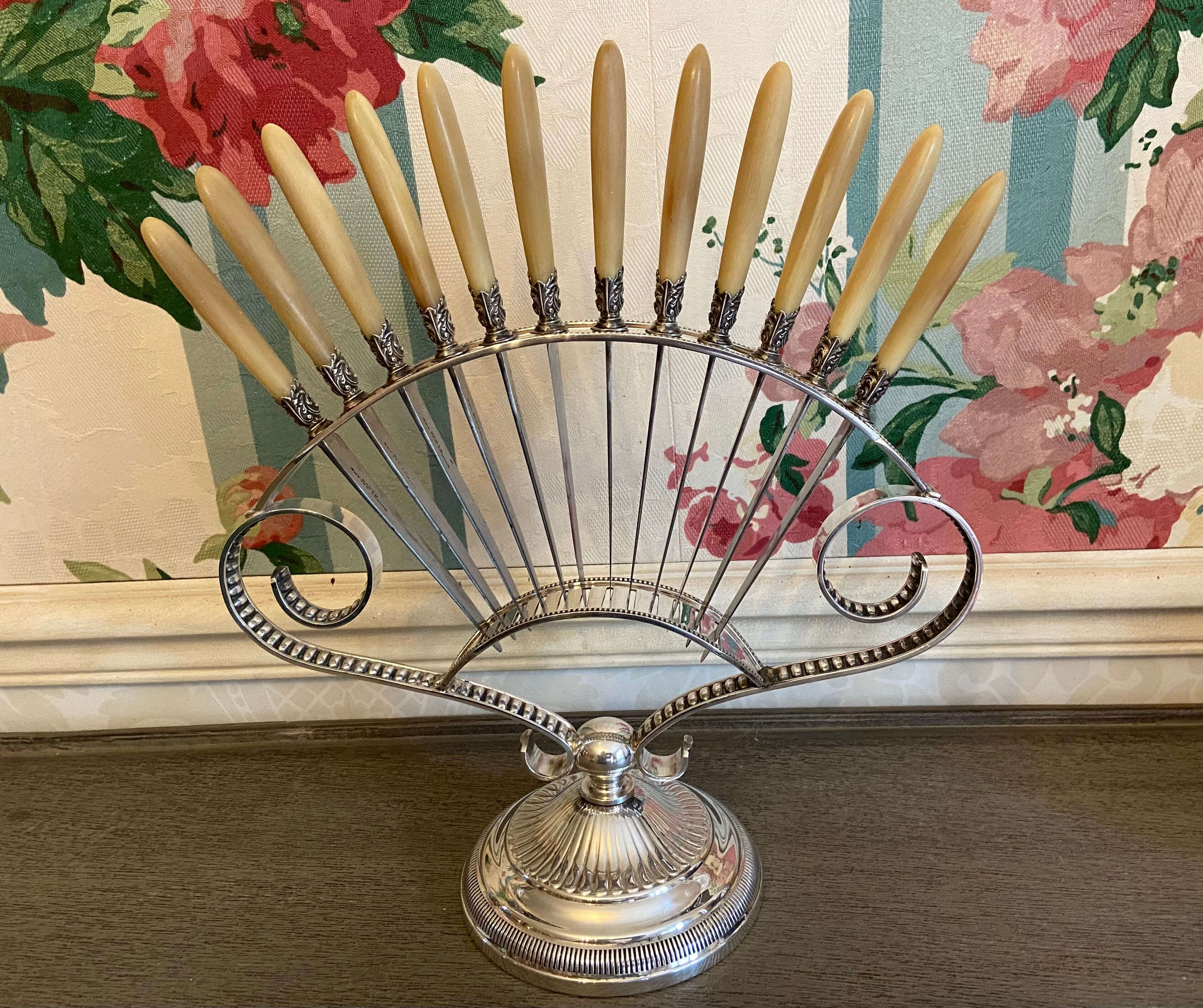 12 small antique knives and their fan knife holders