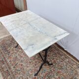 Bistro table with cast iron legs and marble top