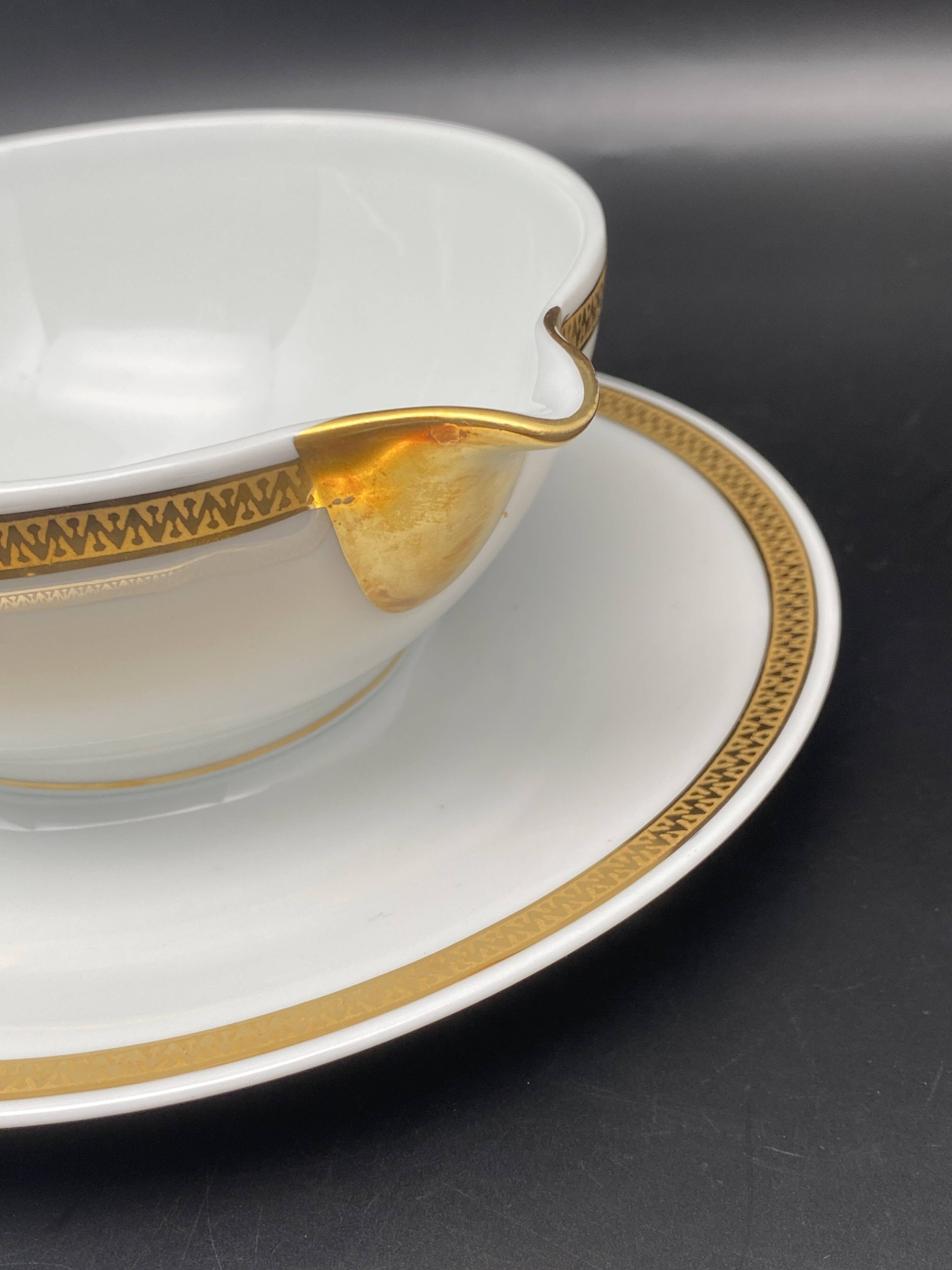 Limoges porcelain gravy boat with gold edging