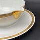 Limoges porcelain gravy boat with gold edging