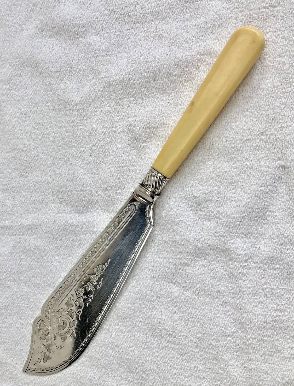 Antique Victorian fish serving cutlery, bone and silver-plated metal