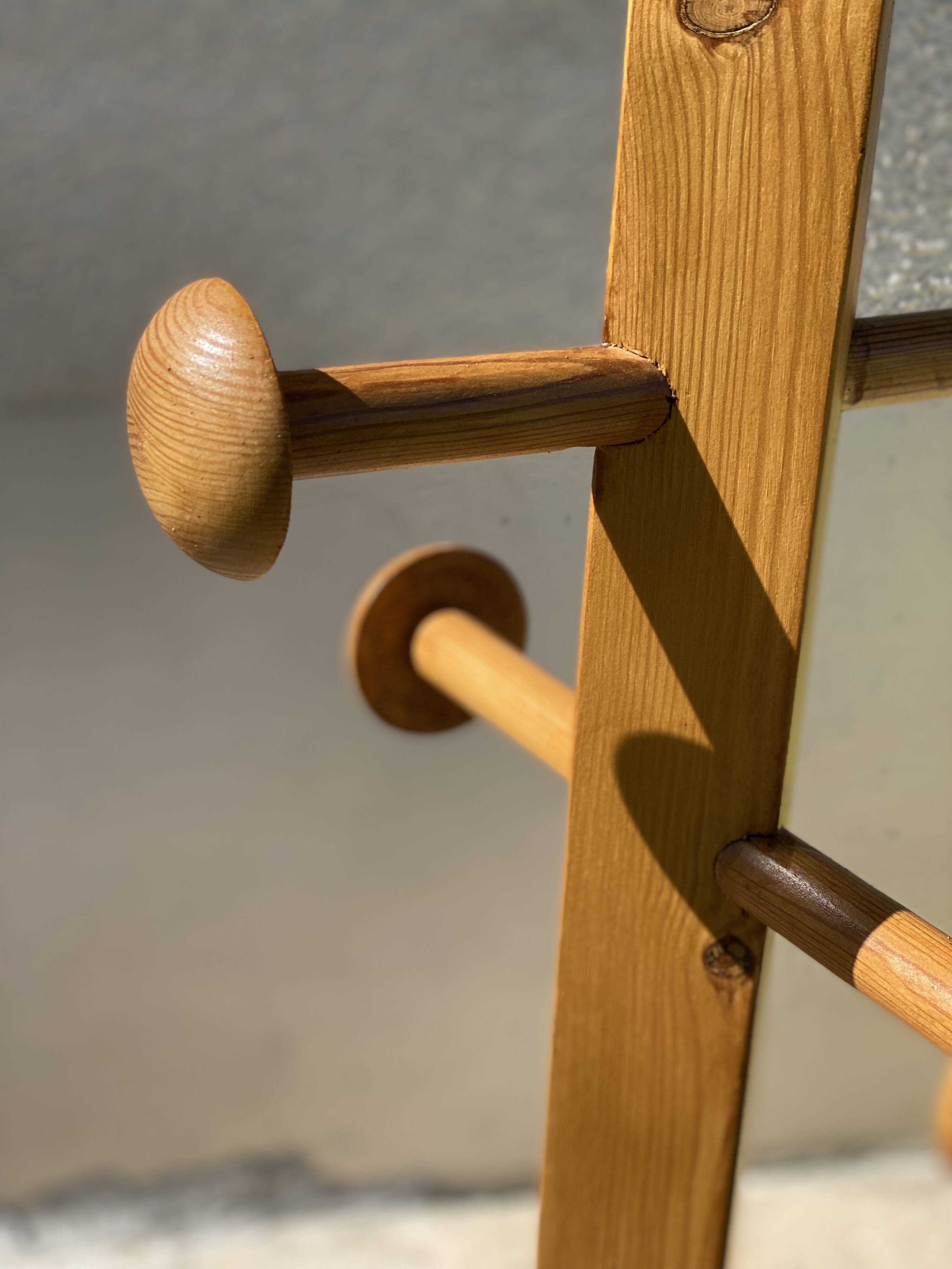 Modernist coat rack with 8 vintage 1980 hooks.