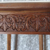 Carved wooden side table