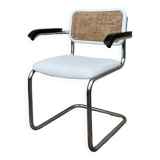 Cantilever armchair in cane and bouclette fabric