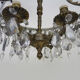Old chandelier in bronze or silver brass, 4 lights, crystal grapevines. Year 60 70