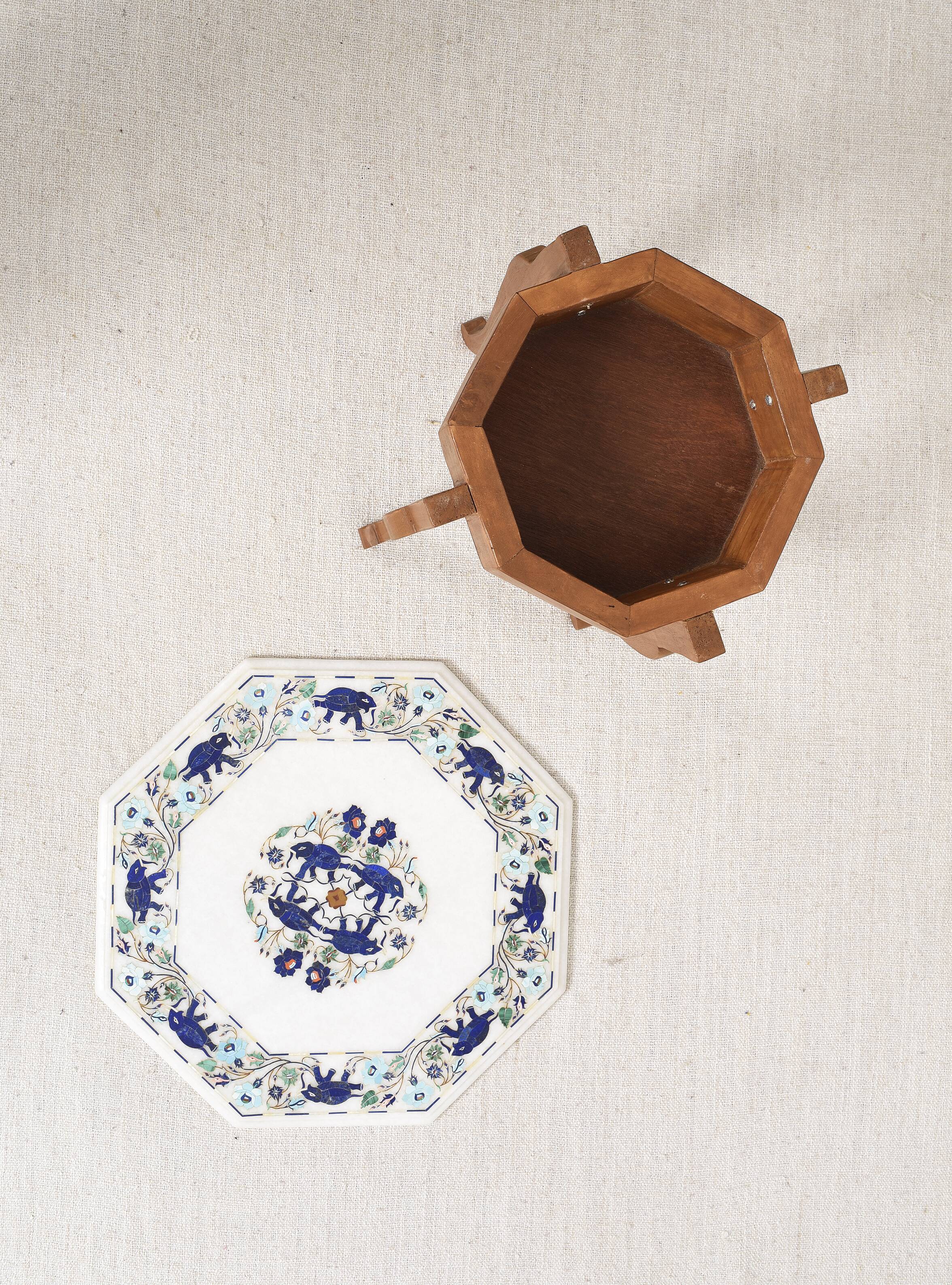 Side table with marble top and inlaid stones