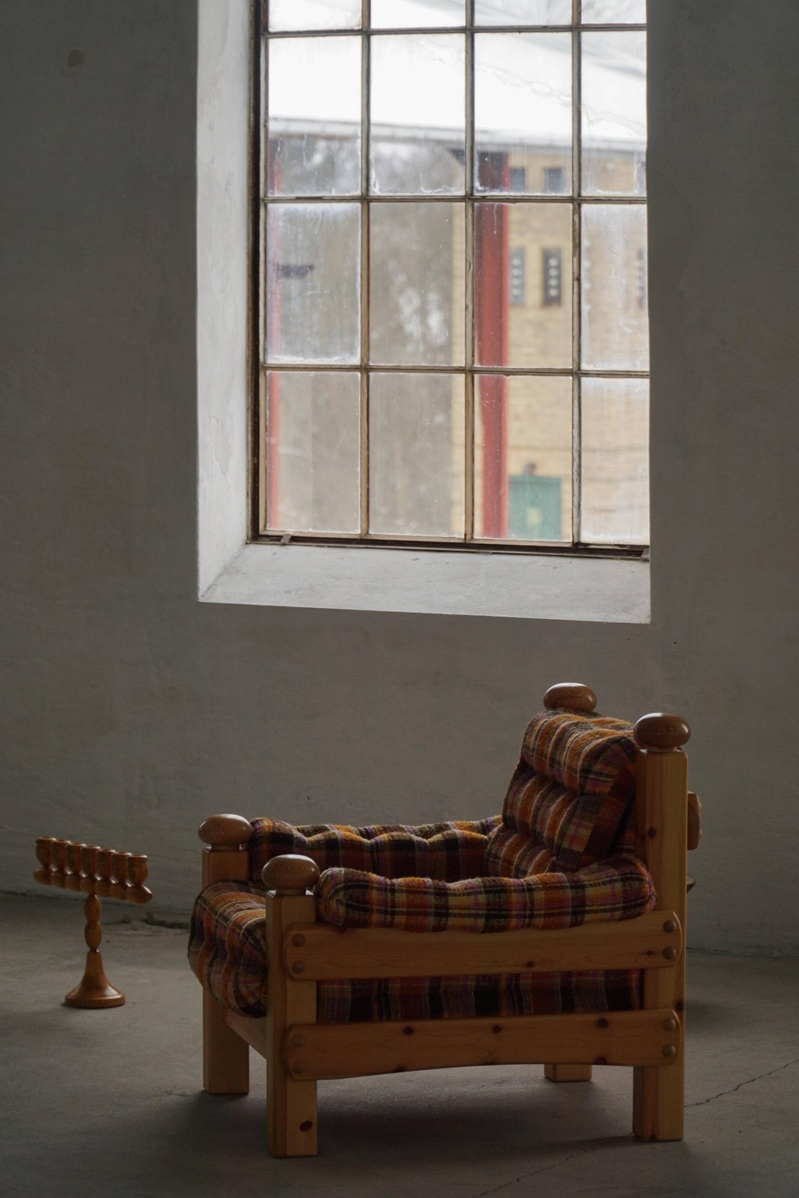 Brutalist lounge chair in solid pine, Swedish modern, made in the 1970s.