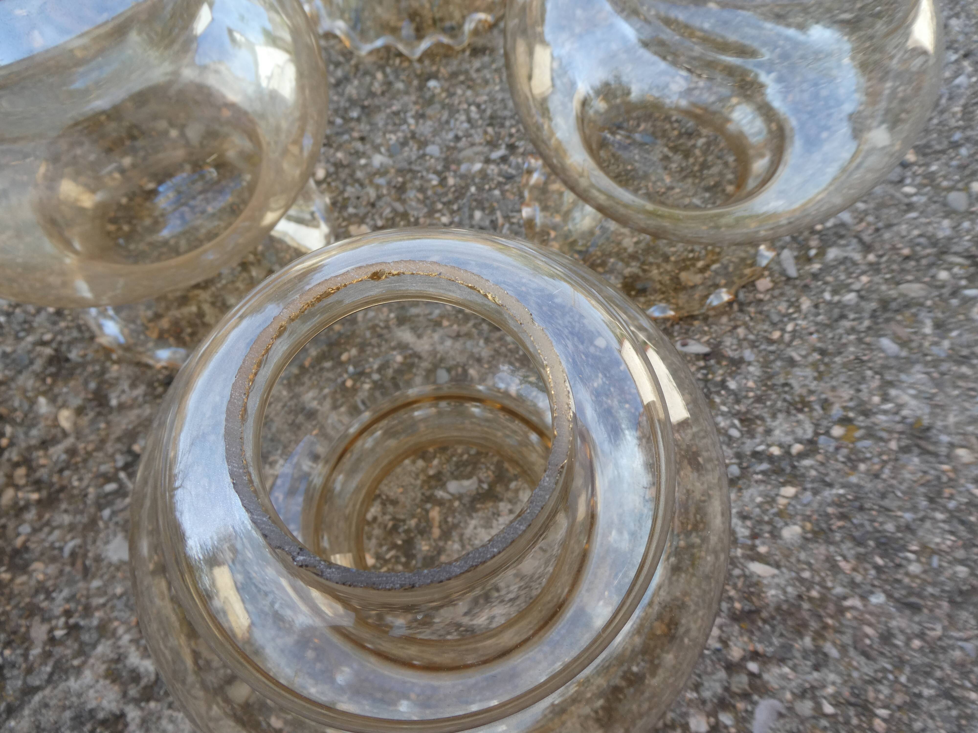 Set of 6 amber glass globes.