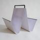Metal magazine holder by Pete Sans for NRO
