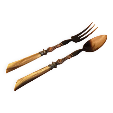 Vintage serving cutlery in horn and wrought metal