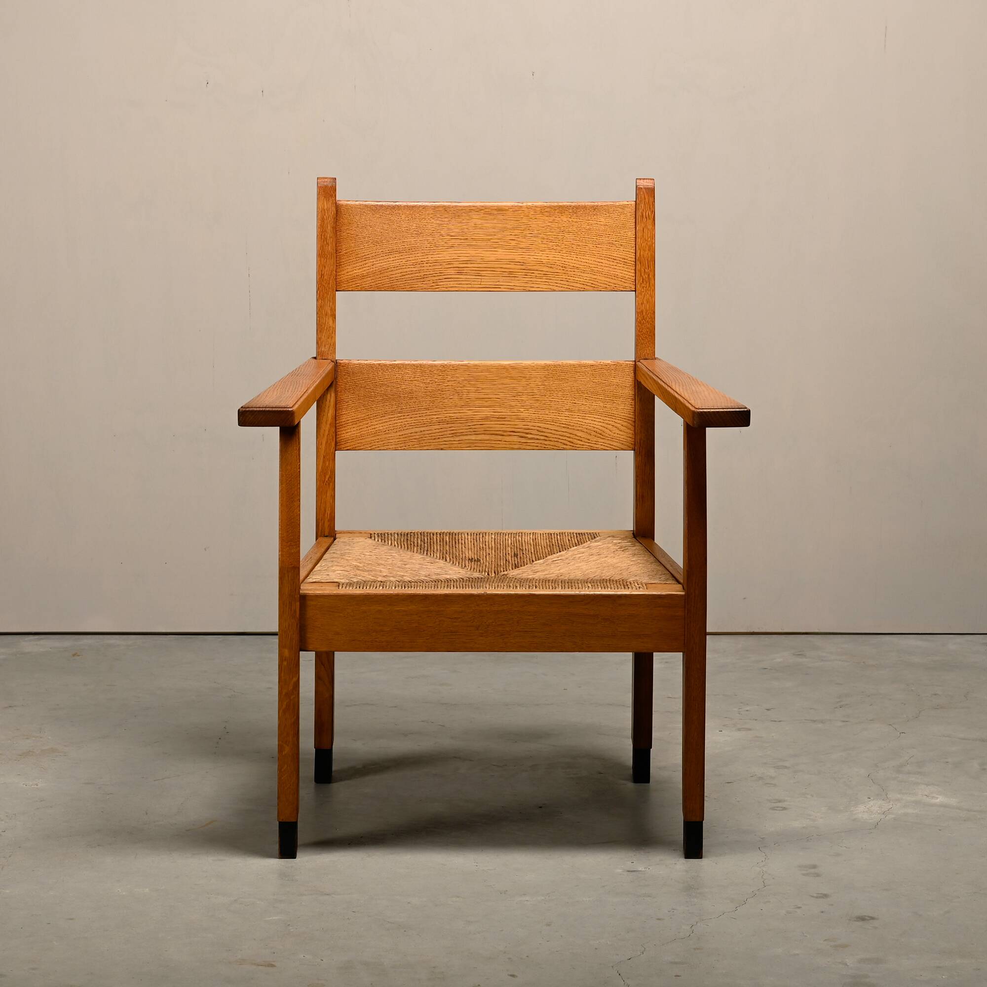 Art Deco Haagse School Armchair in solid Oak and Straw, 1930s